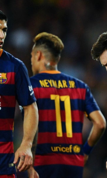 Messi scores number 500 but Barcelona still fall to plucky Valencia